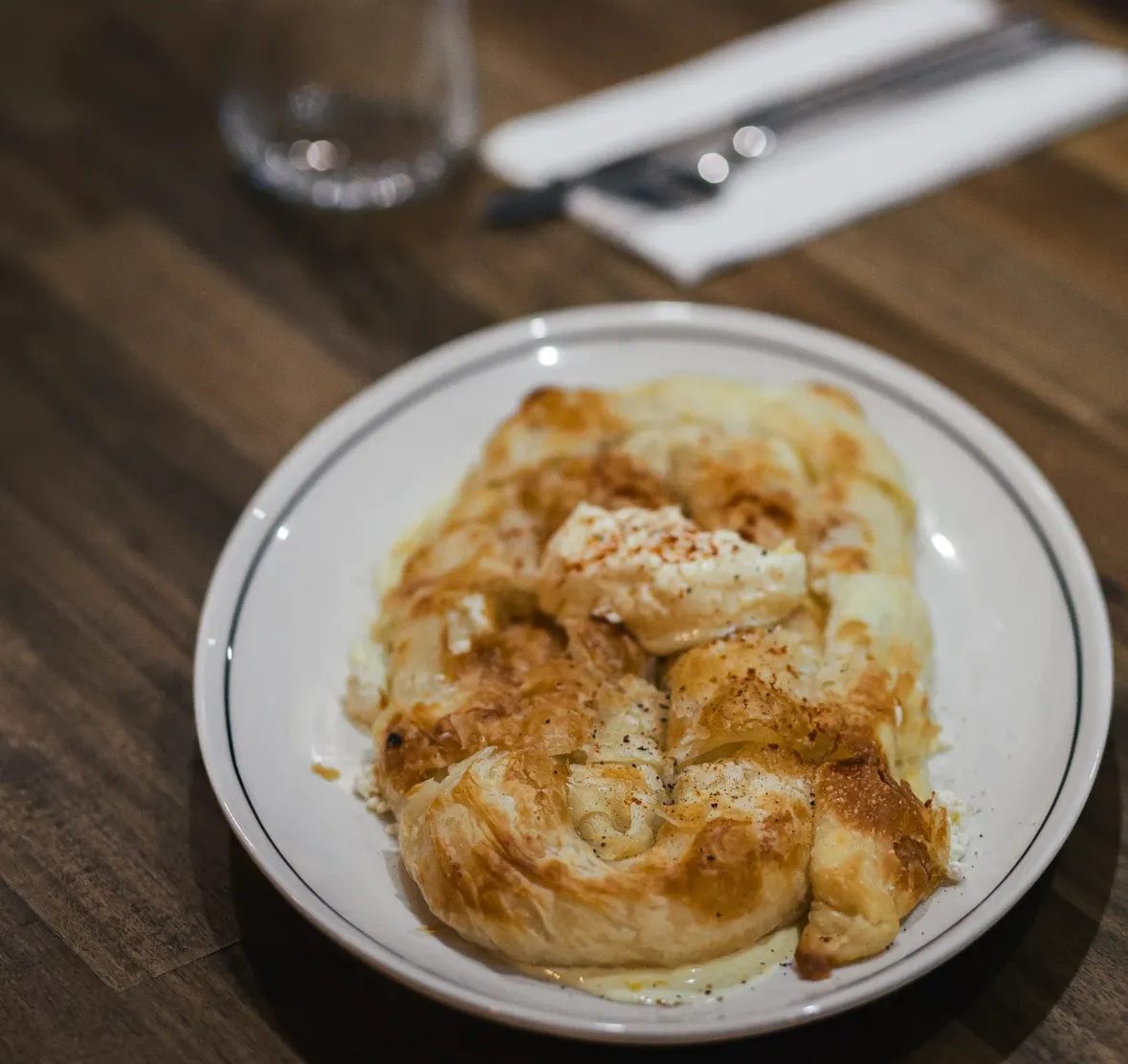Golden burek with kajmak and paprika